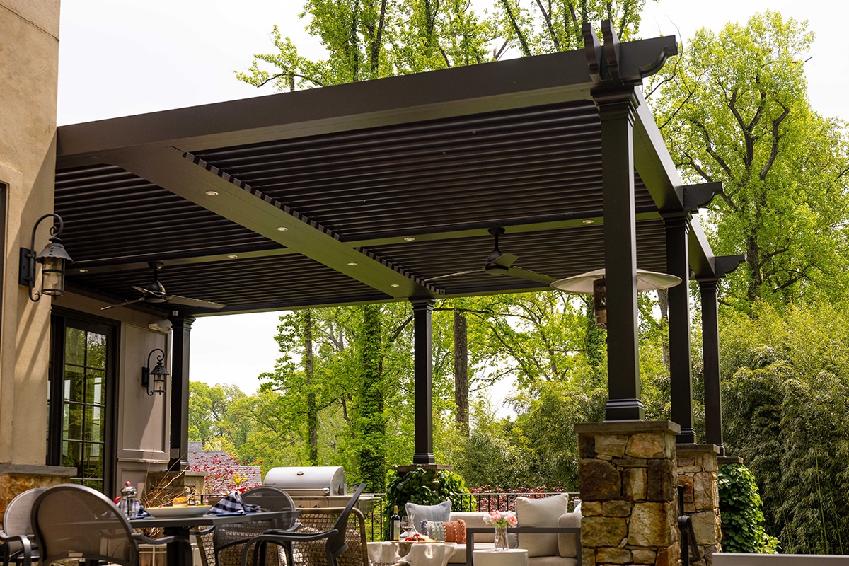 The Smart Pergola patio cover installed over a residential outdoor living space.