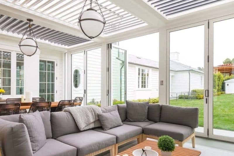 white aluminum louvered pergola